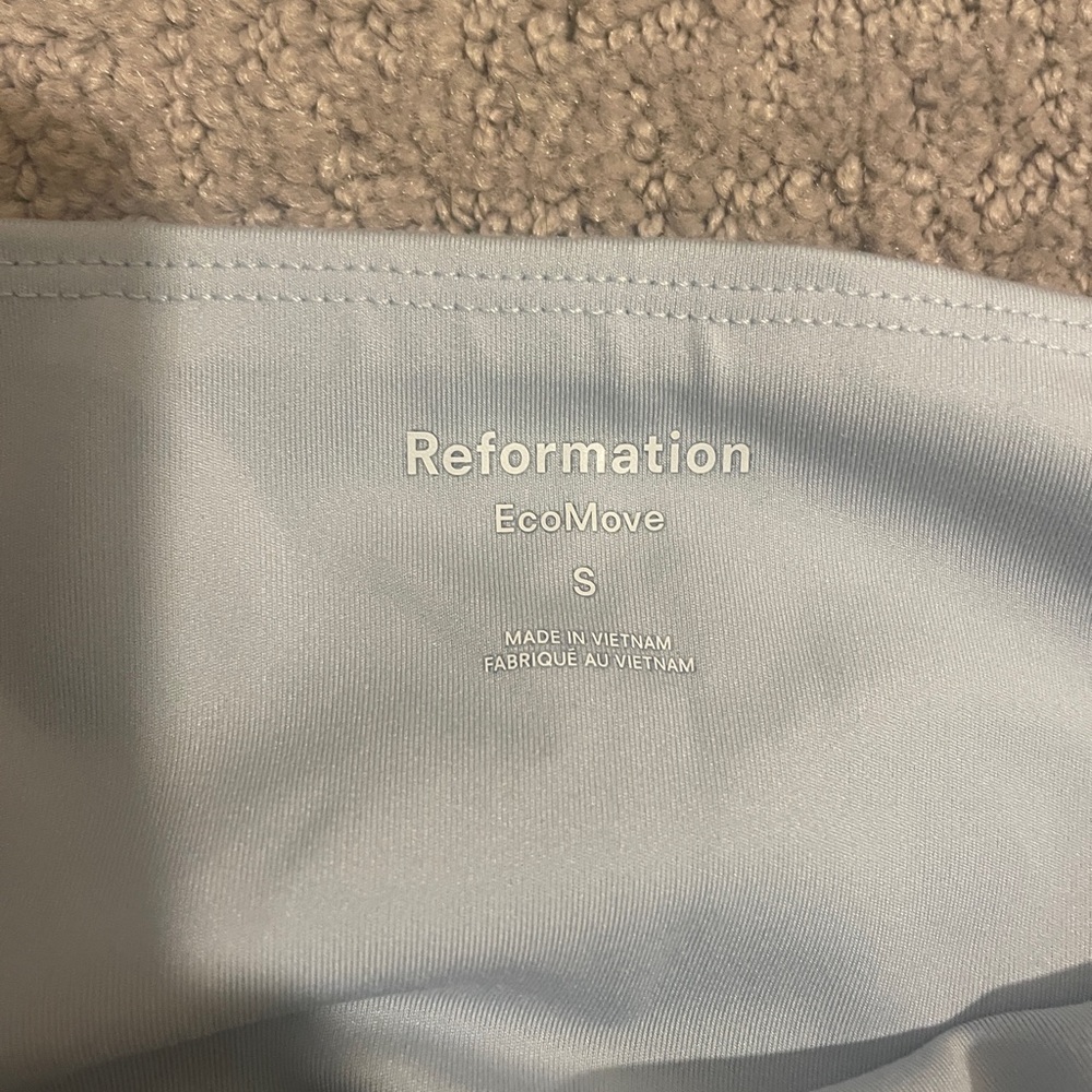 Reformation leggings, two pairs (blue and pink) both size S